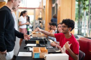 Student checking in at move-in table_Photo by Holden Blanco '17